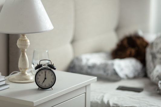 Alarm clock on nightstand fatigue blog main image